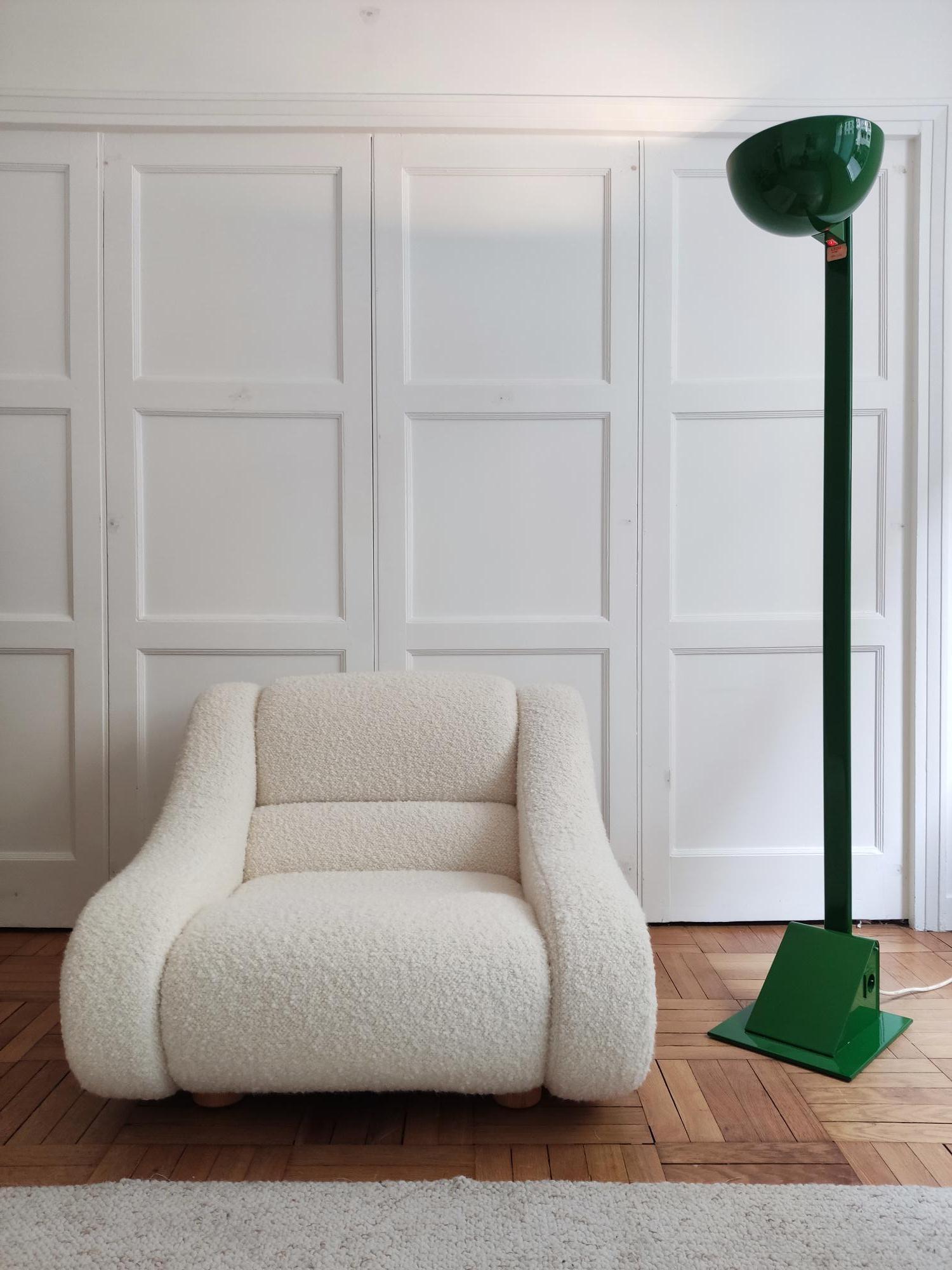 Pair of Swedish industrial floor lamps produced by Ledu design and designed by Bjorn Sahlén. Model entirely restored in green lacquer giving it a very contemporary appearance. The graphic lines between a well-rounded head and a more angular base