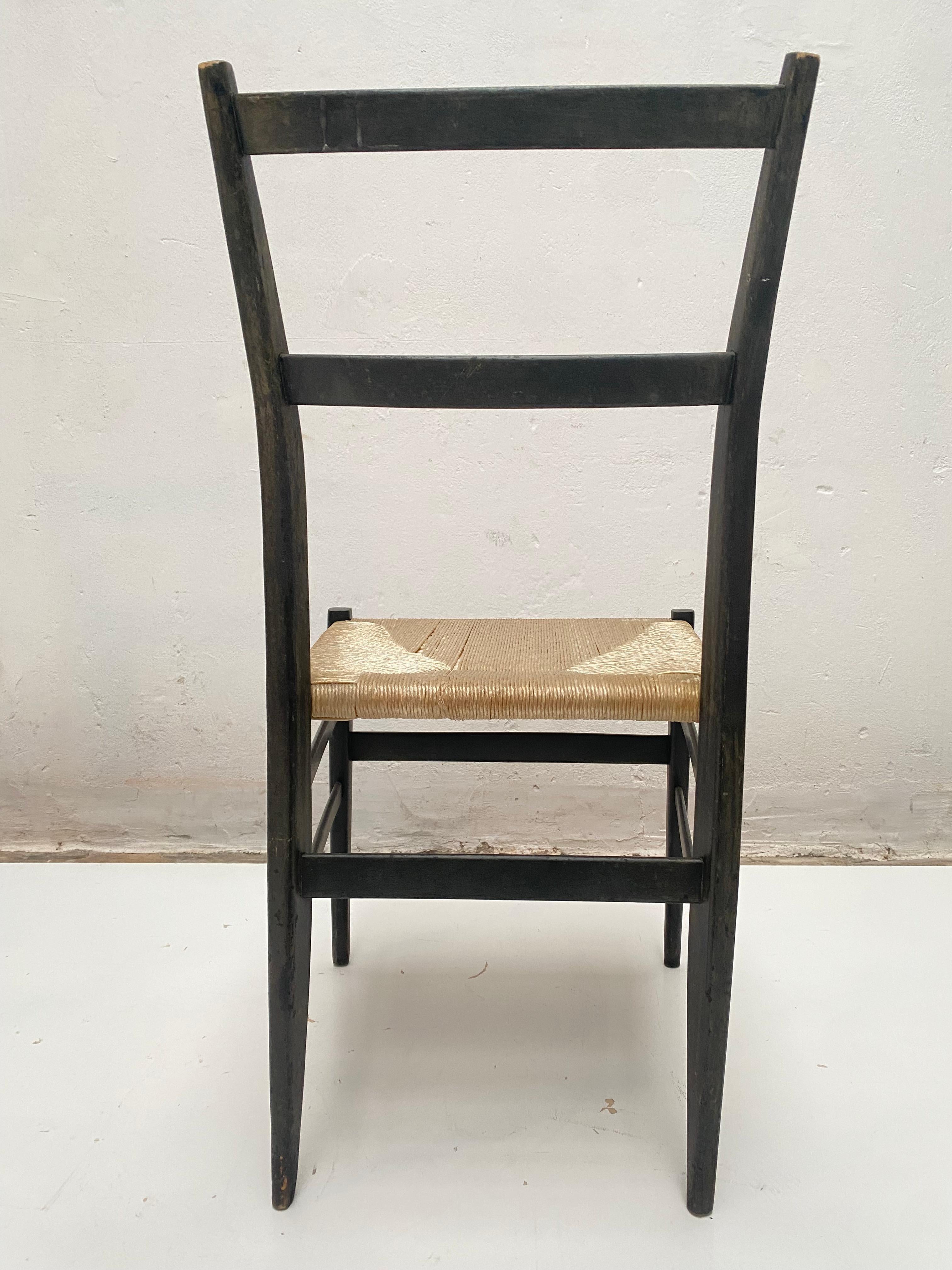 Italian Pair of Leggera Black Ebonized Wooden Dining Chairs by Gio Ponti, Italy, 1950s For Sale