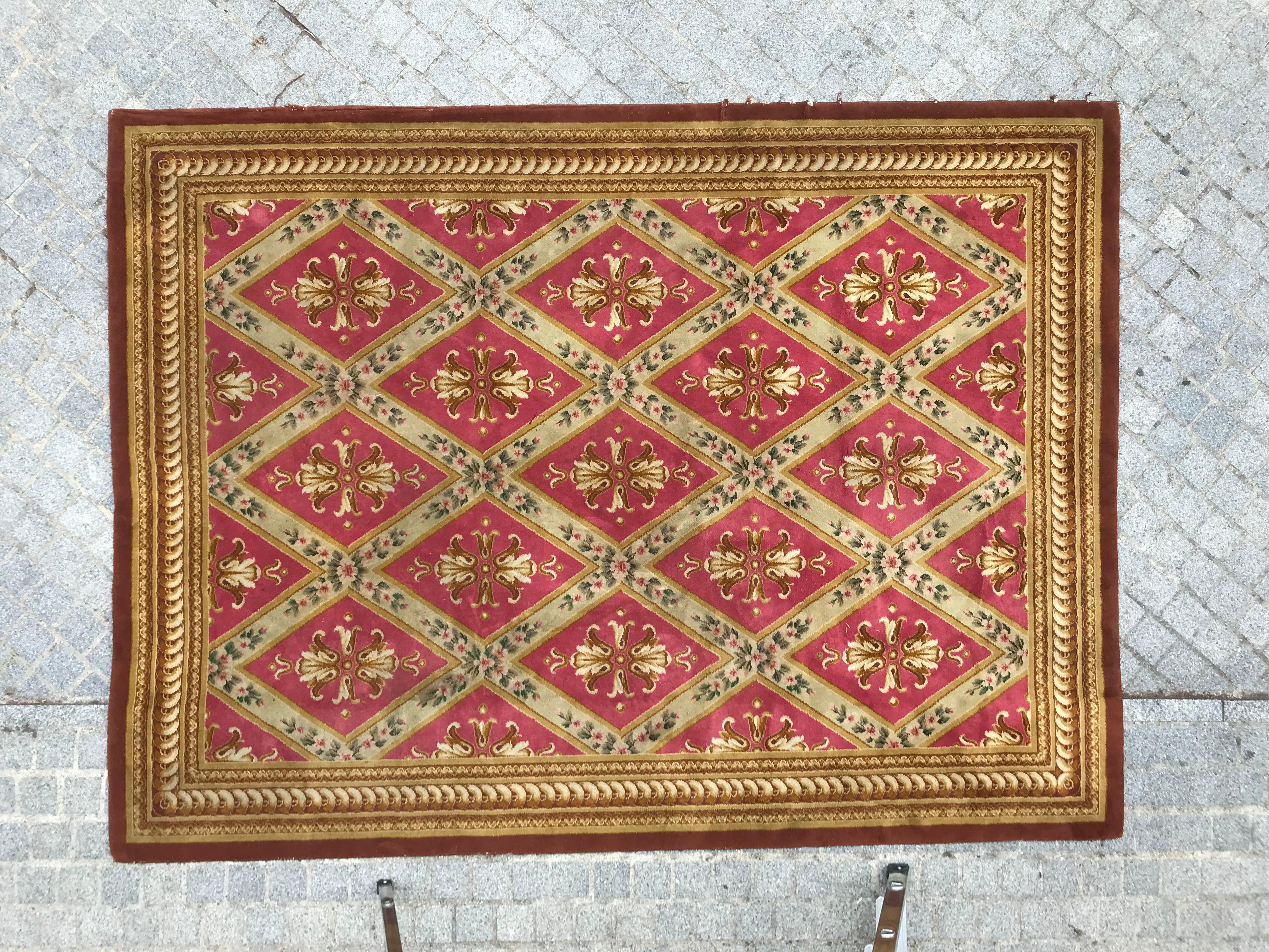 A lot of a pair of French Leleu rugs mid-20th century entirely hand knotted with wool velvet on cotton foundation. Including a Knotted Aubusson rug with a Louis XVI style Savonnerie design, wool velvet on cotton foundation.