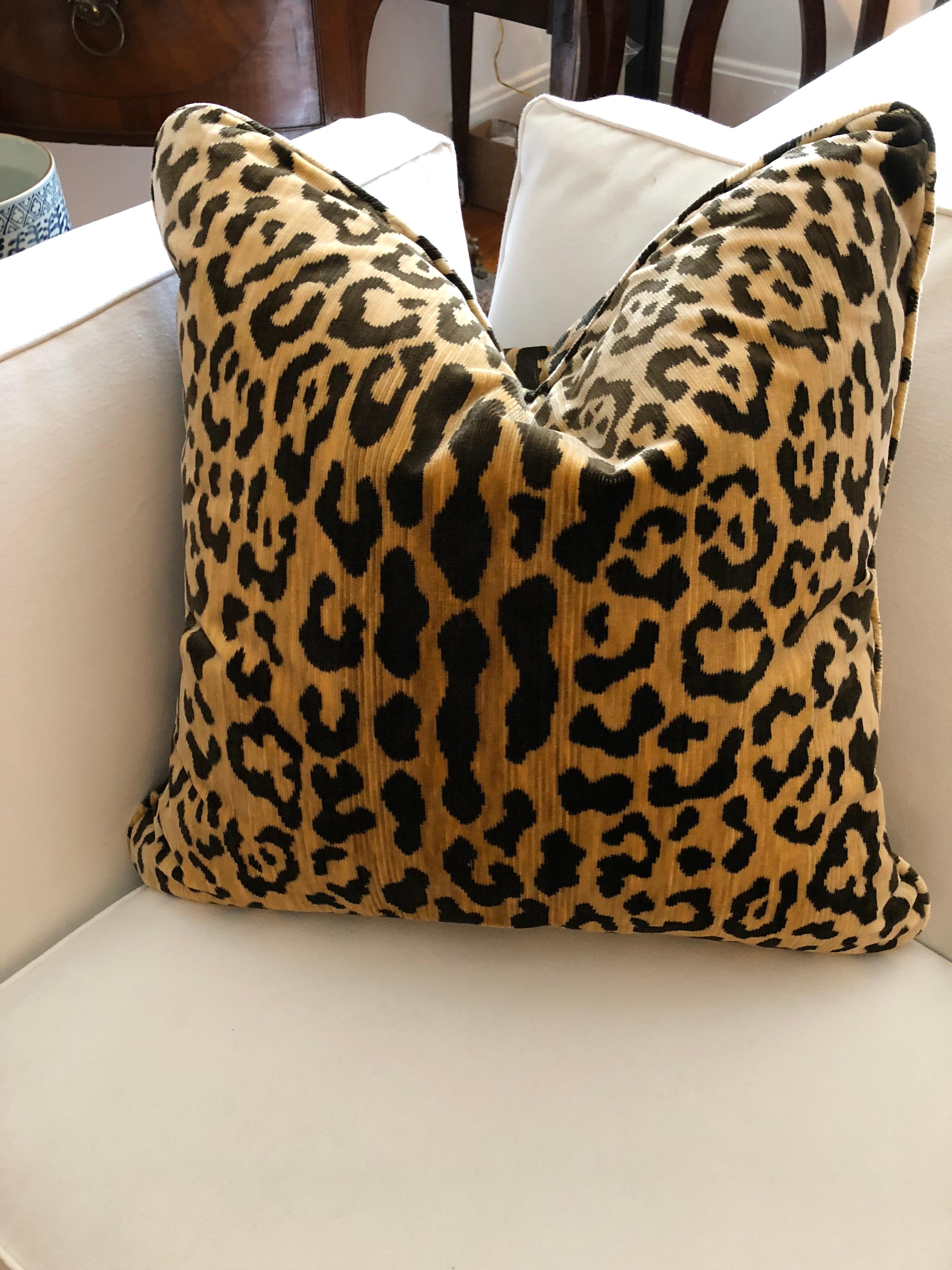 Decorative pair of square leopard velvet cushions.