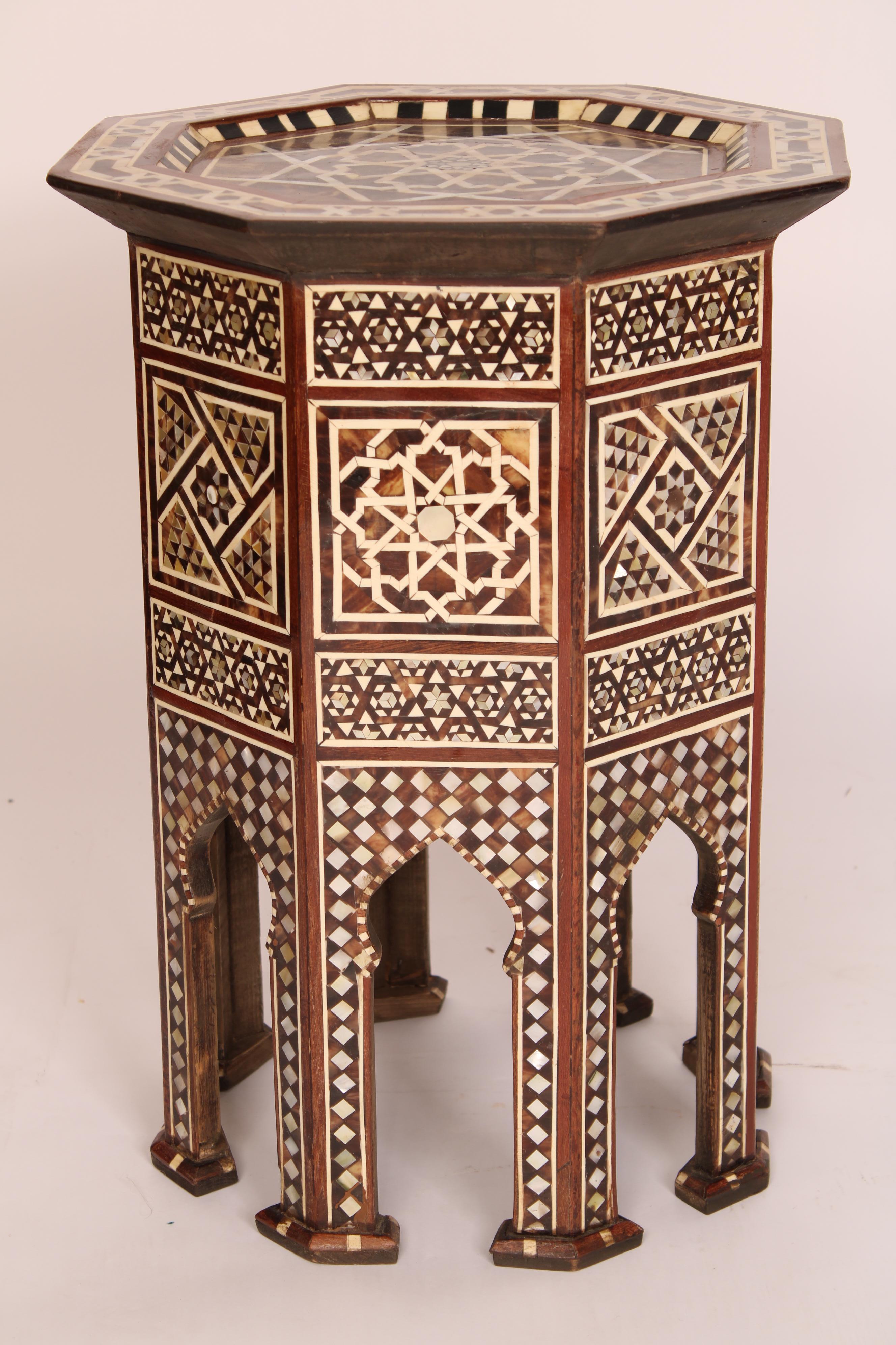 Pair of Levantine mother of pearl and bone inlaid octagonal shaped side tables, early 21st centtury.