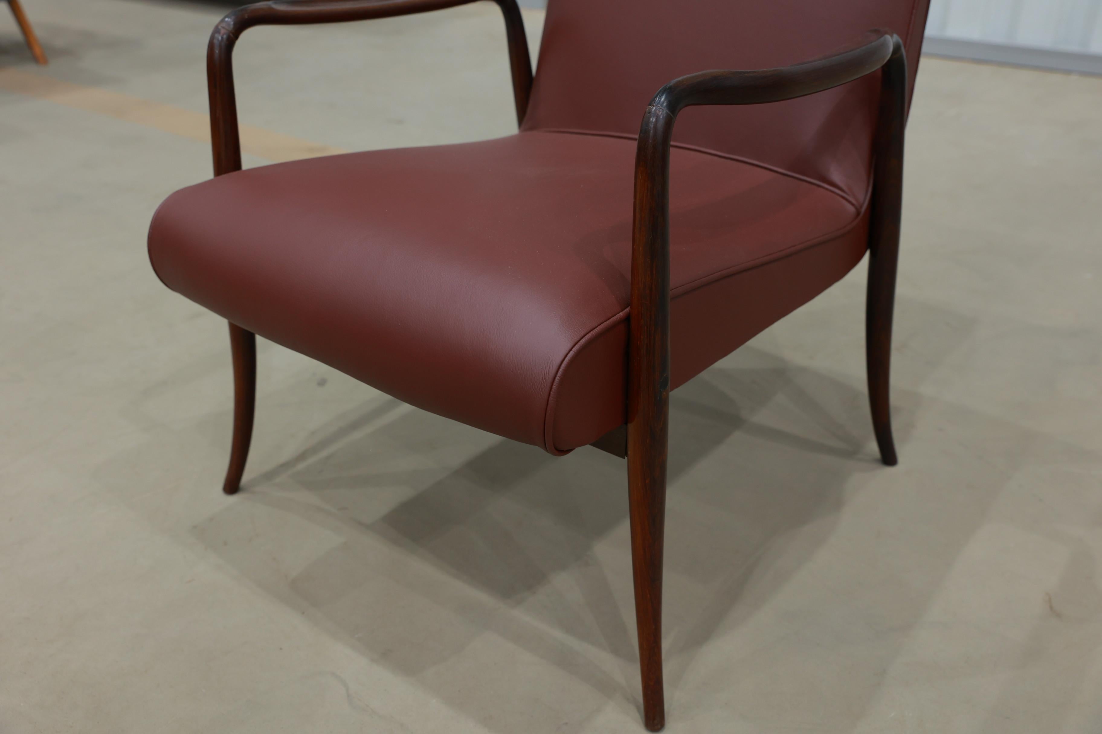 Brazilian Pair of “Leve” armchairs in hardwood & leather by Joaquim Tenreiro, 1942, Brazil For Sale