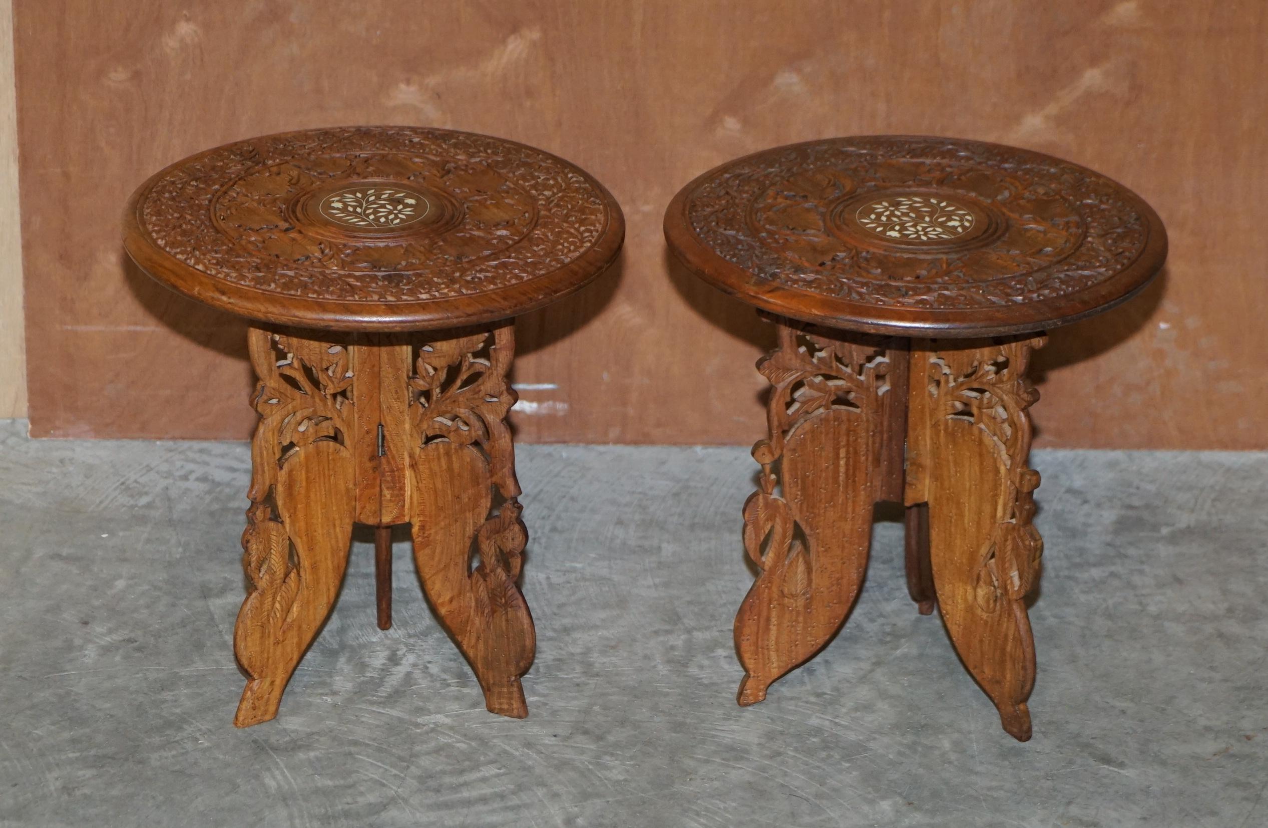 We are delighted to offer for sale this lovely pair of rare Moroccan hand carved lamp tables retailed through Liberty's London circa 1900.

These are a lovely good sized and very decorative pieces, ideally suited simply for decoration or as lamp