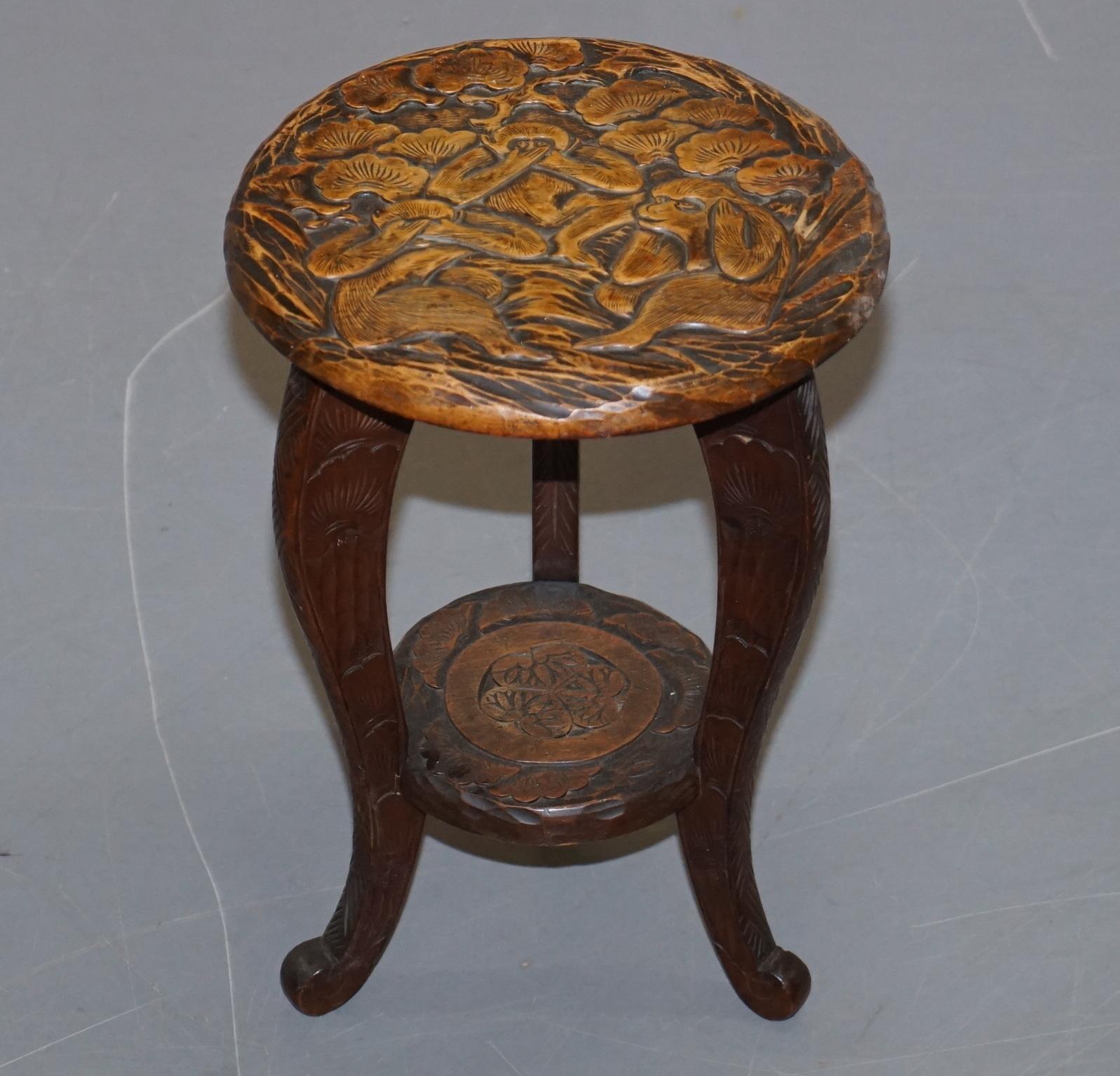 We are delighted to offer for sale this lovely pair of Liberty’s London 1905 Japanese mahogany side tables depicting the three monkeys in the 