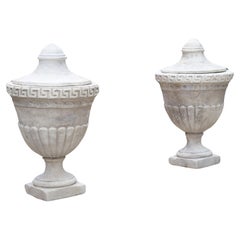 Pair of Lidded Cast Limestone Greek Key Urns from Southern Italy