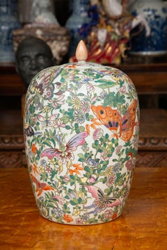 Pair of Lidded Melon Shaped Chinese Export Butterfly Pattern Jars