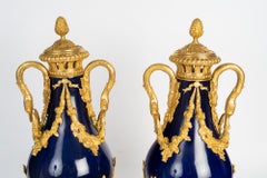Pair Of Lidded Vases In Sèvres Blue Porcelain, Gilded Bronze, Napoleon III-era.