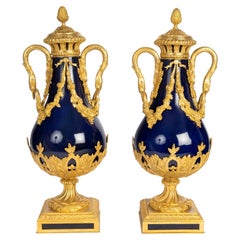 Pair Of Lidded Vases In Sèvres Blue Porcelain, Gilded Bronze, Napoleon III-era.