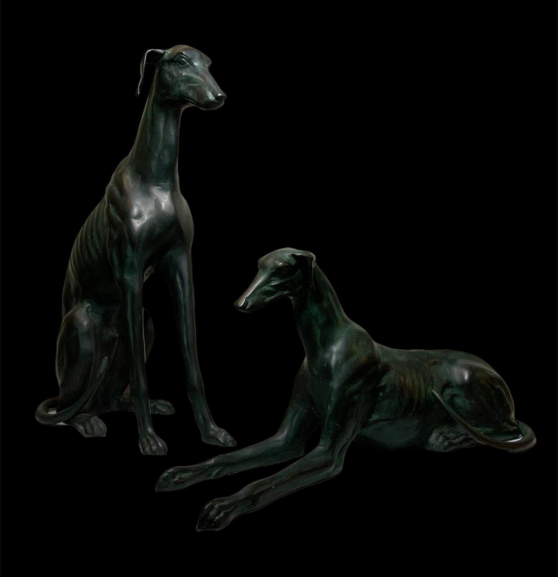 Cast Pair of Life Size Elegant Whippet Dog Patinated Bronze Sculptures