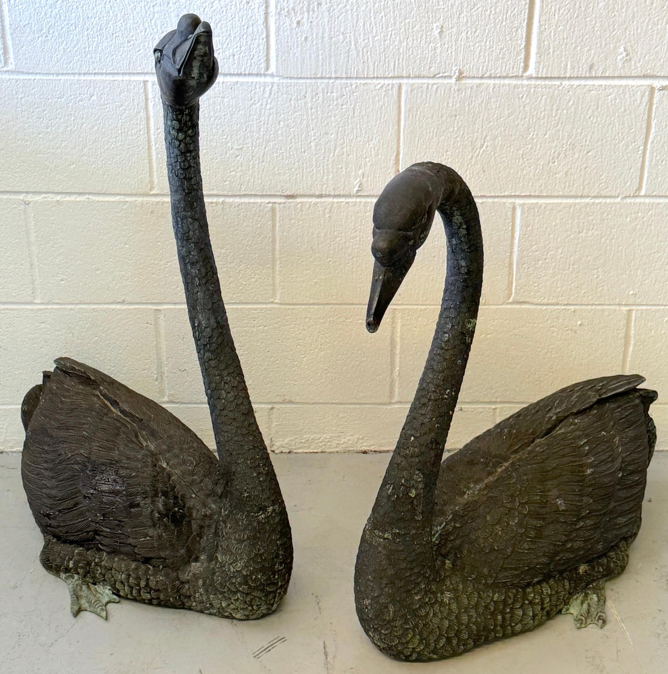 Pair of Life-Size Patinated Bronze Garden Swans, France, 20th Century (Pre-WWII)

A monumental and finely detailed pair of life-size patinated bronze swans, French, early 20th century, pre-WWII. Each swan is superbly cast with naturalistic