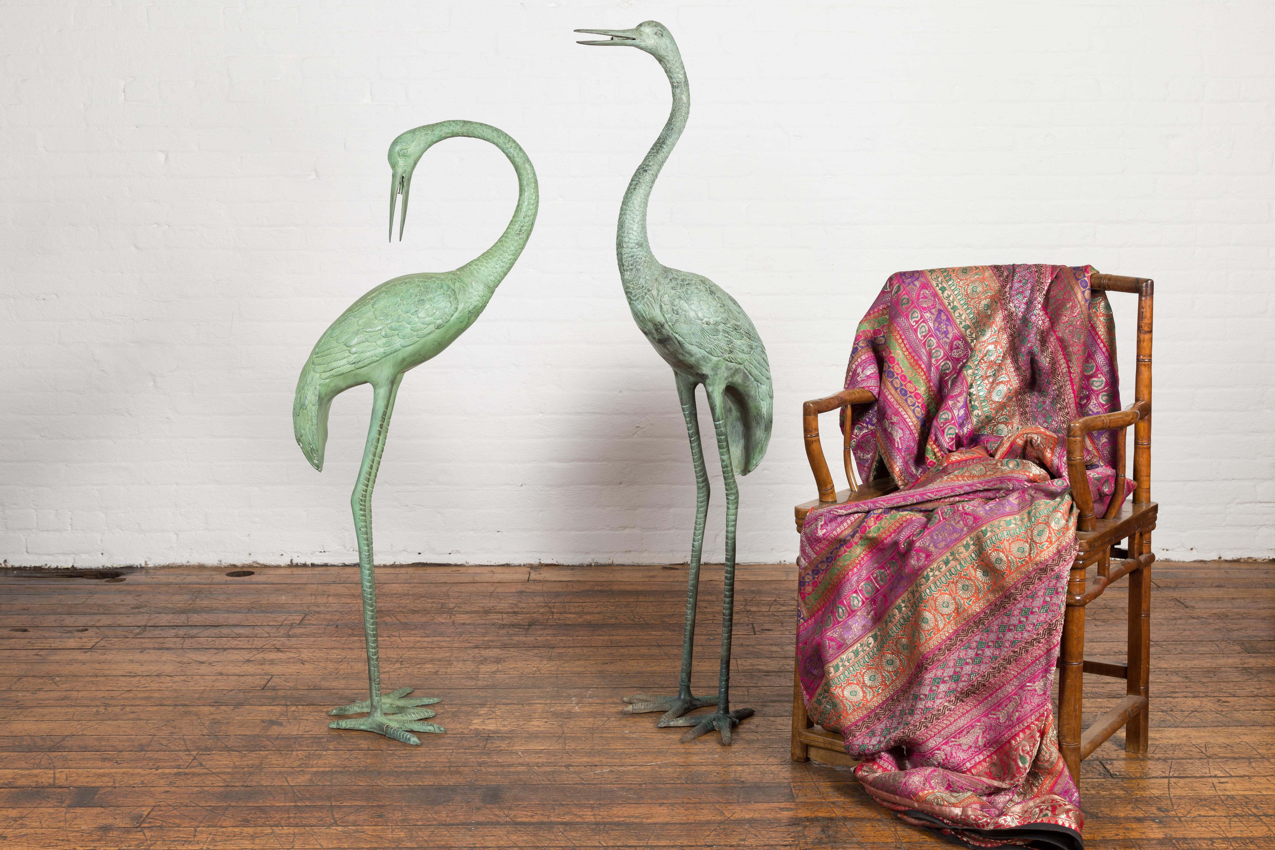 Contemporary Pair of Lifesize Lost Wax Cast Bronze Crane Sculptures with Verdigris Patina For Sale
