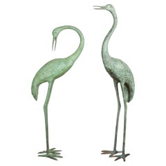 Pair of Lifesize Lost Wax Cast Bronze Crane Sculptures with Verdigris Patina