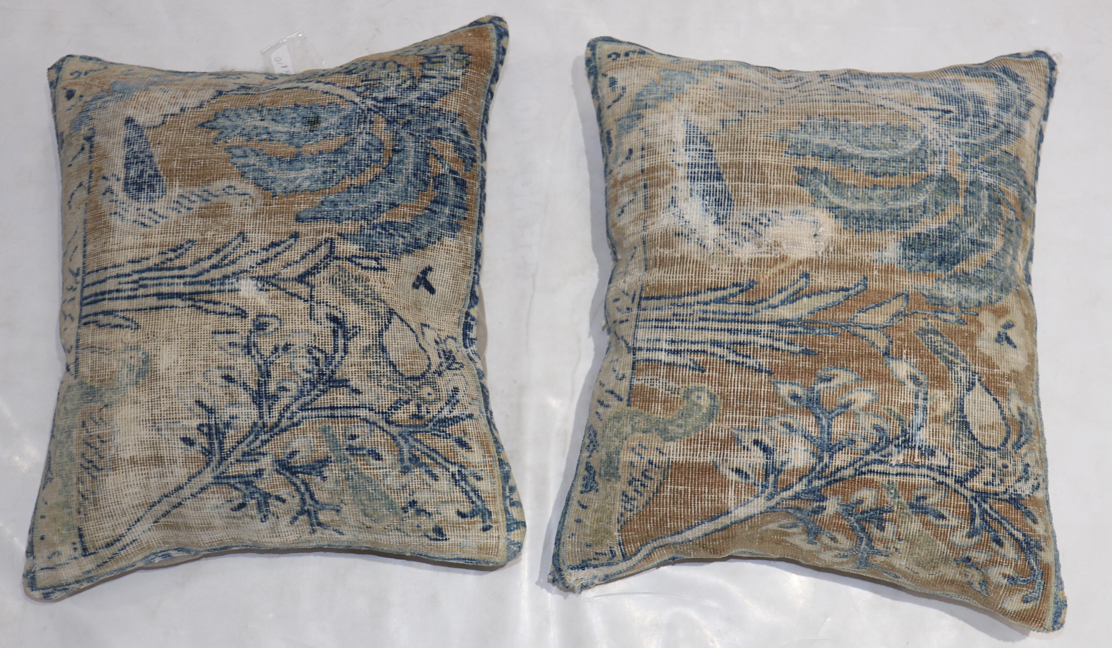 Set of pillows made from a 19th century Persian Tabriz Pictorial rug. Each pillow has a polyfill insert and zipper closure

Both measure 19'' x 22''.