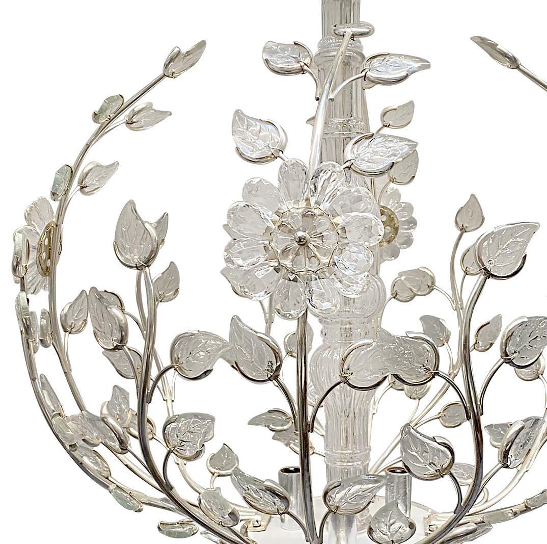 A pair of circa 1940s French silver-plated light fixtures with molded glass leaves and flowers and four interior lights. Sold individually.

Measurements:
Diameter: 24?
Drop: 26?.