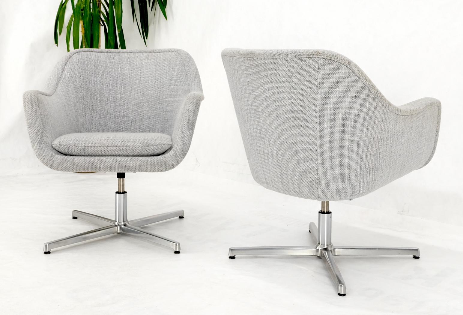 Pair of light grey basket weave upholstery barrel back desk office chairs on chrome cross x shape bases.