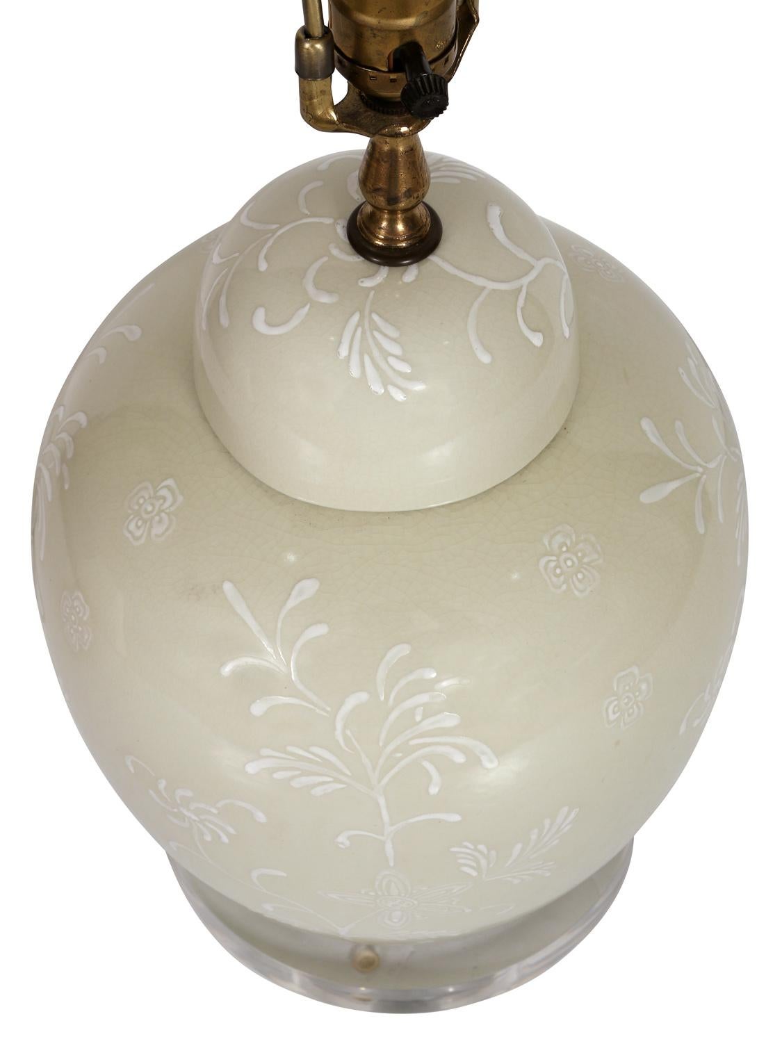 Pair of Light Grey Ceramic Lamps with Floral Design In Good Condition In New York, NY