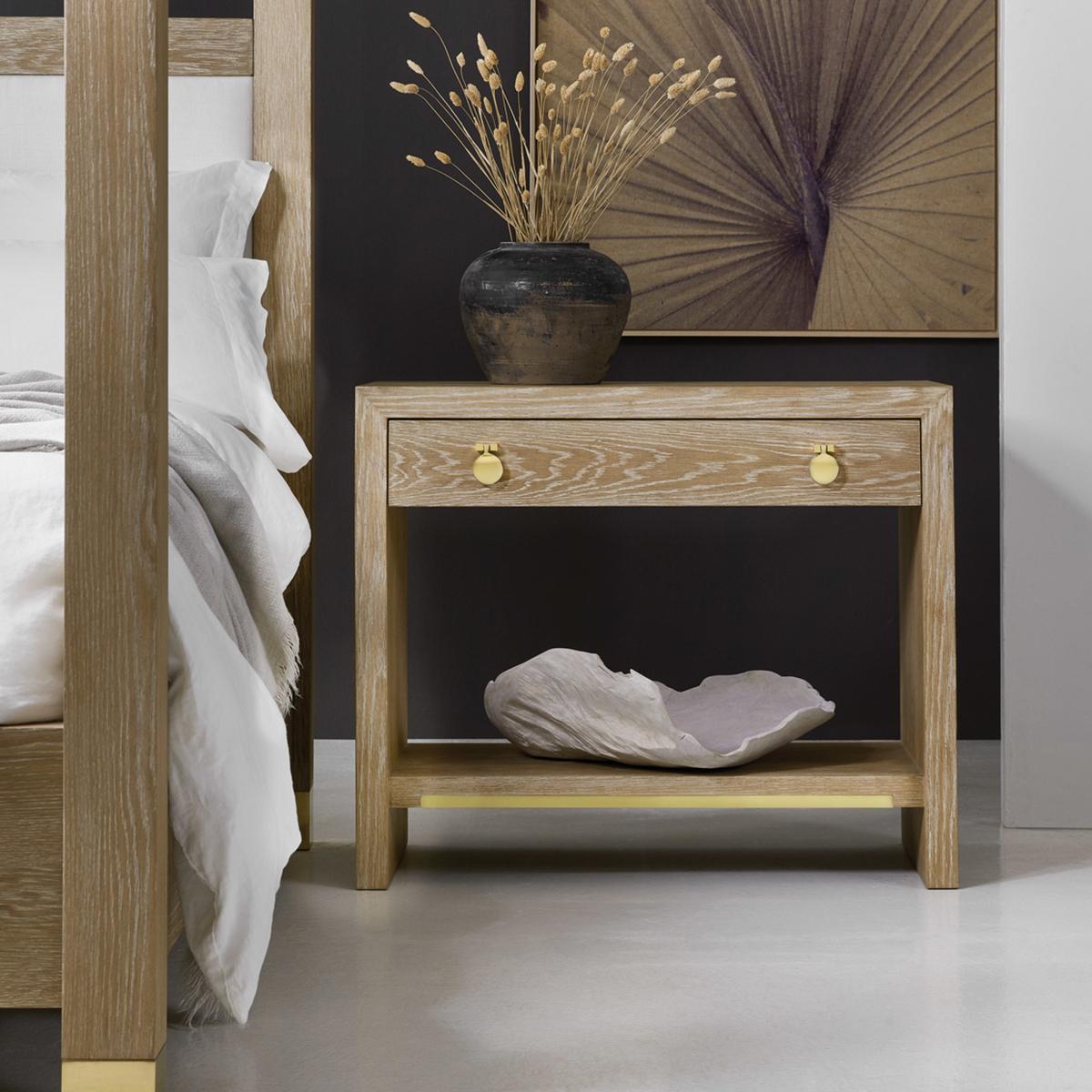 Light Oak Modern Nightstand with a whitewashed natural oak finish, a simple cubist form with a soft closing single drawer having modern polished brass drop pulls, and the lower shelf with brass trim.

Dimensions: 38