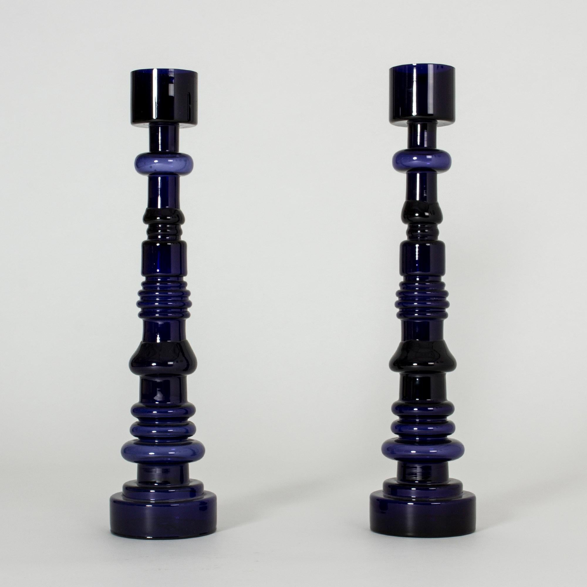 “Lighthouse” candlesticks of majestic proportions by Oiva Toikka for Nuutajärvi. Deep blue hand blown glass. Both signed on the bottom and with original sticker.