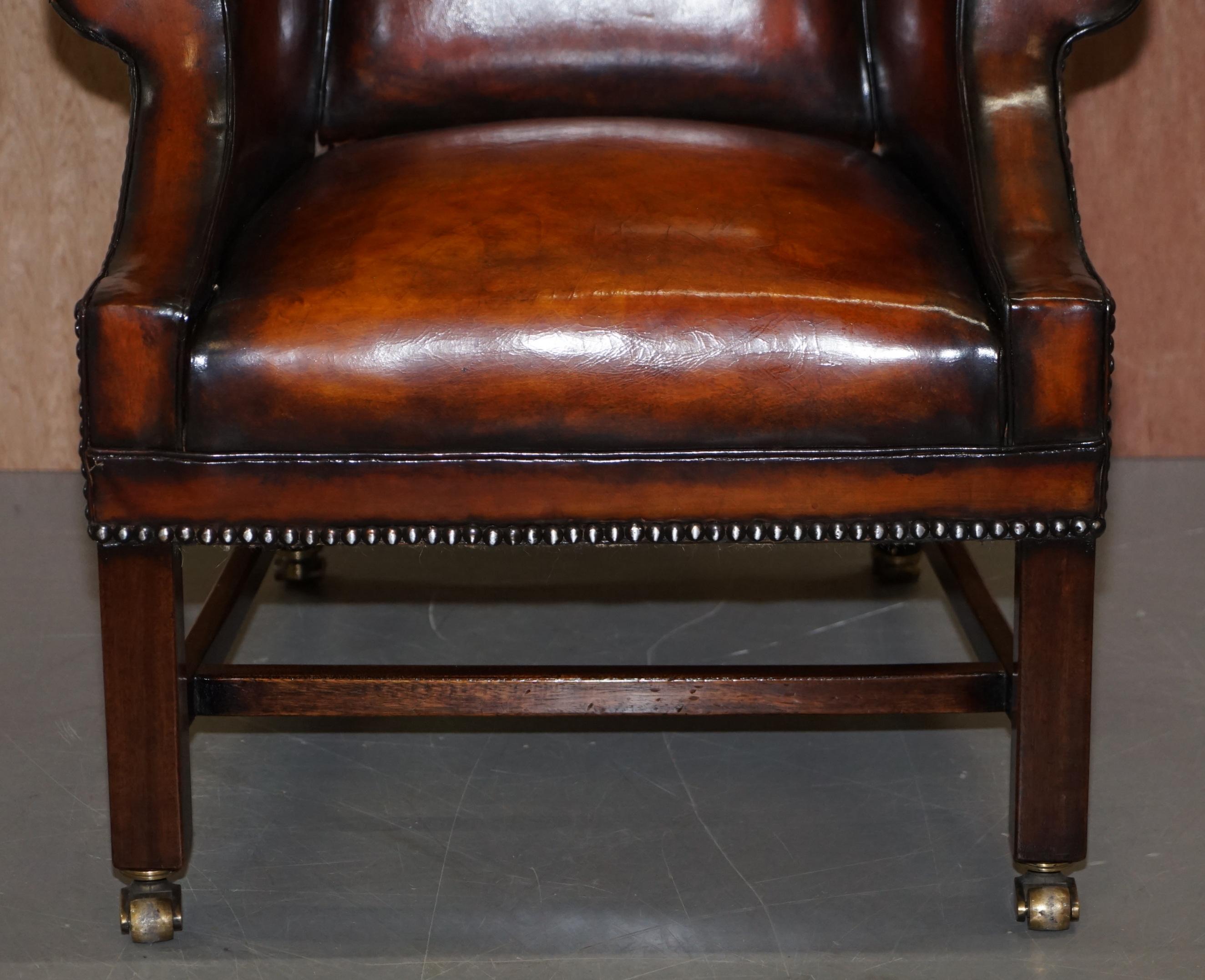 Pair of Lightly Restored George III circa 1780 Wingback Brown Leather Armchairs 14