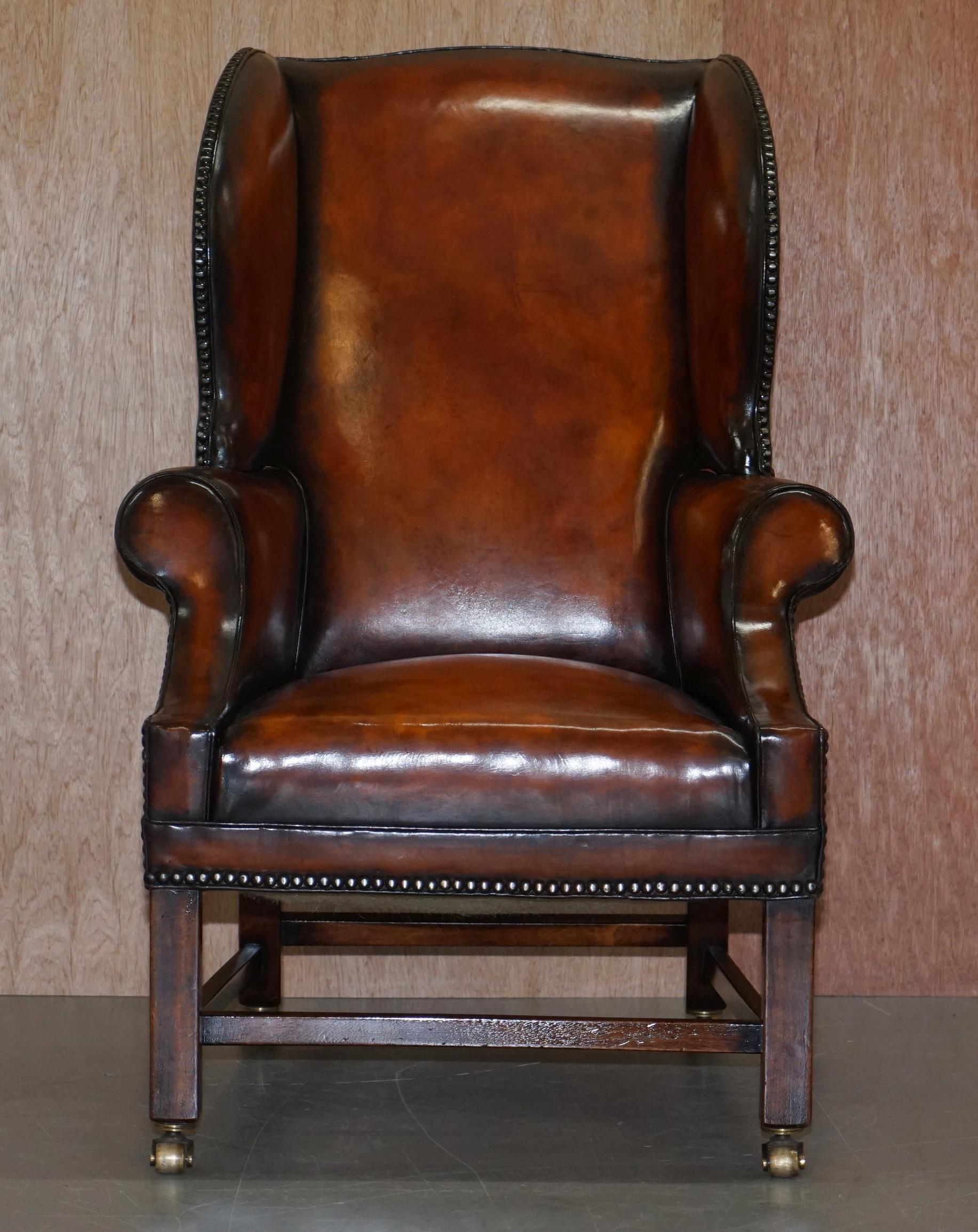 English Pair of Lightly Restored George III circa 1780 Wingback Brown Leather Armchairs