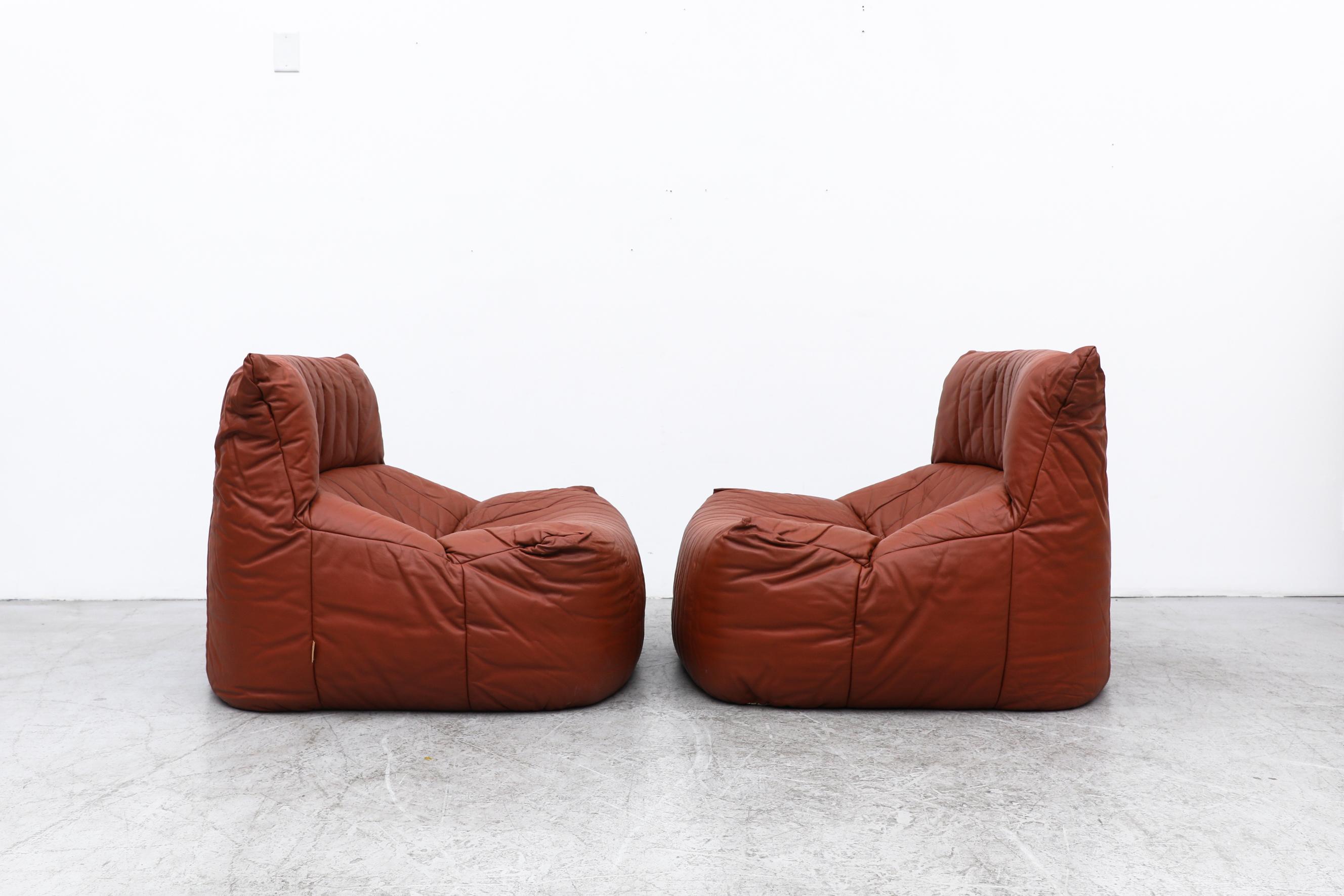 Pair of Ligne Roset 'Aralia' lounge chairs by Michel Ducaroy (1925-2009) whose most famous work, the iconic Togo Sofa, marked a highpoint in his career at Ligne Roset. These follow in Togo's footsteps with a foundation-less structure that provide