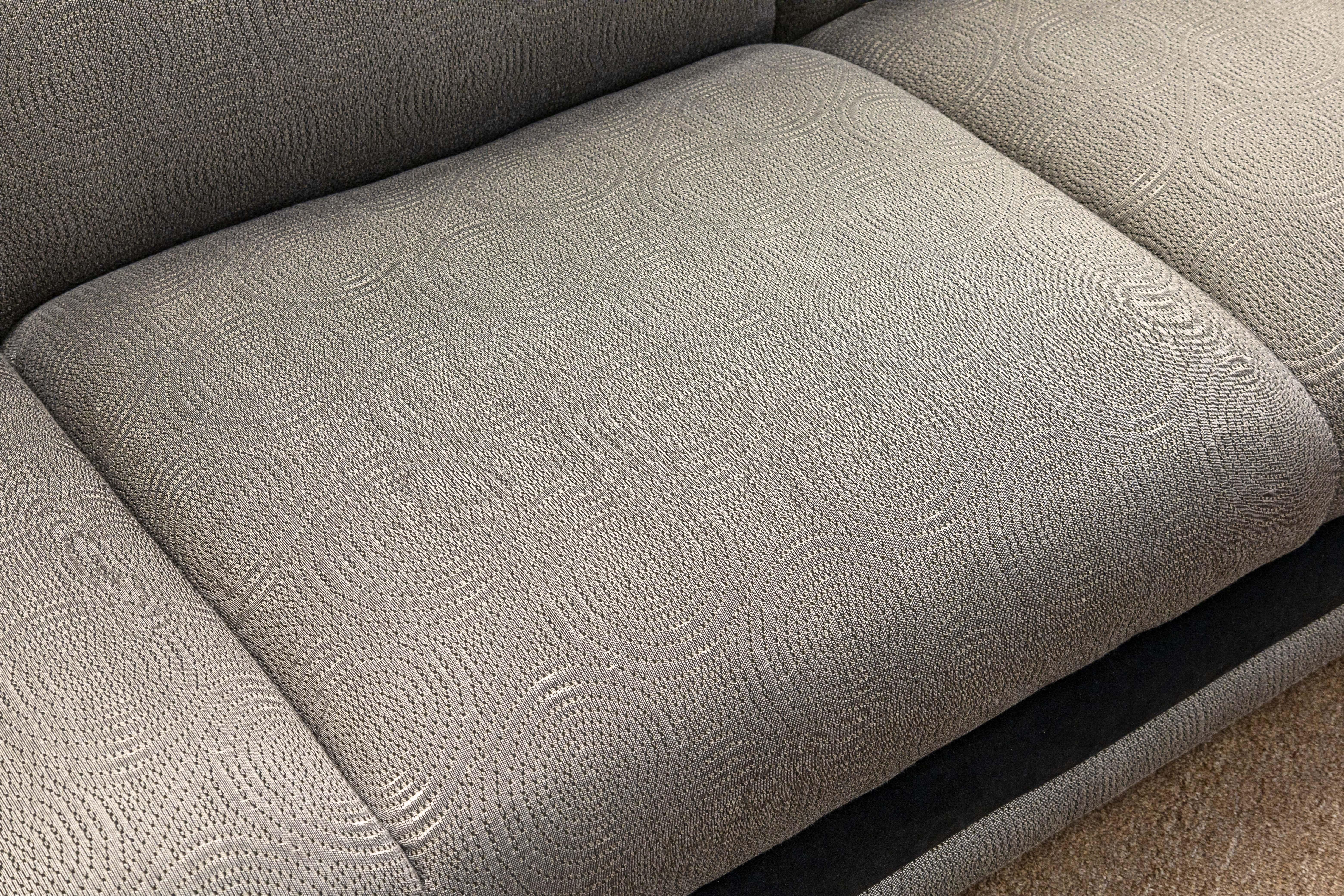 Fabric Pair of Ligne Roset Tufted Gray and Black Matching Sofa Couch and Loveseat Set For Sale
