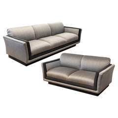 Pair of Ligne Roset Tufted Gray and Black Matching Sofa Couch and Loveseat Set