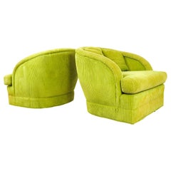 Paire de fauteuils club vert tilleul sur roulettes