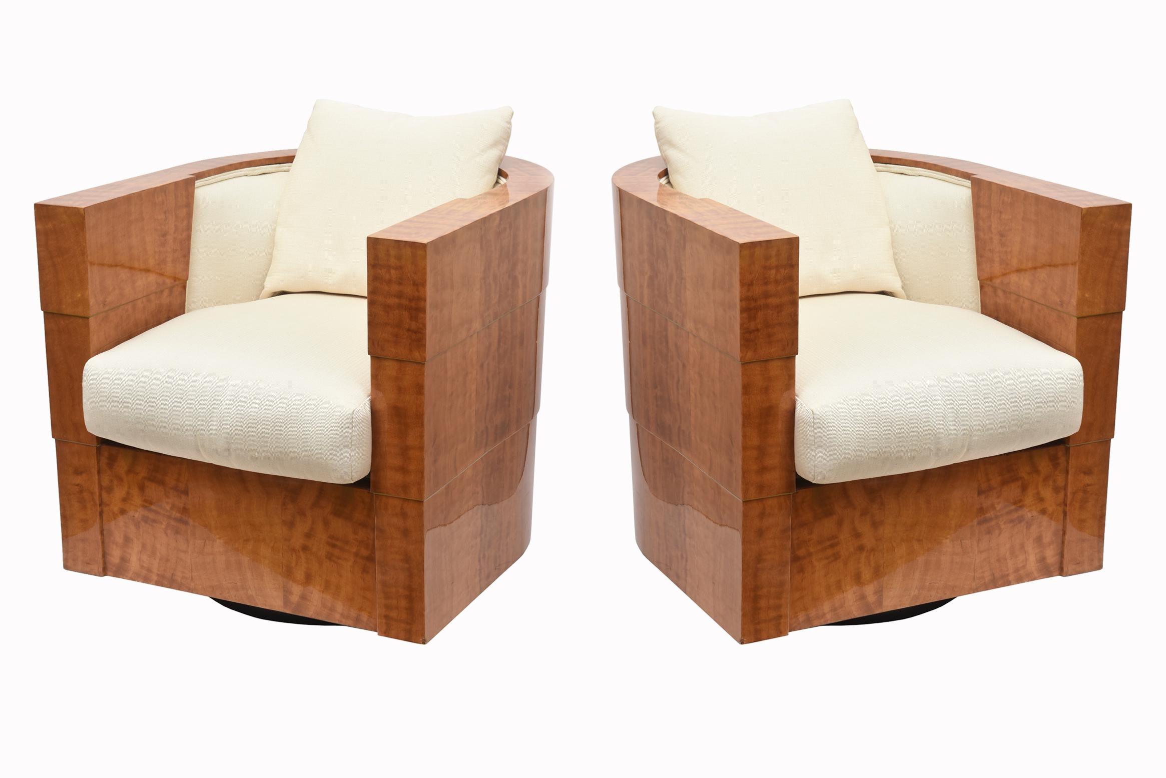 These stunning pair of limited edition swivel Pace club chairs are titled Normandy and were designed by James Rosen of the Rosen Family of the Pace collection. They are made with an exotic veneer finished in high polish lacquer from the South