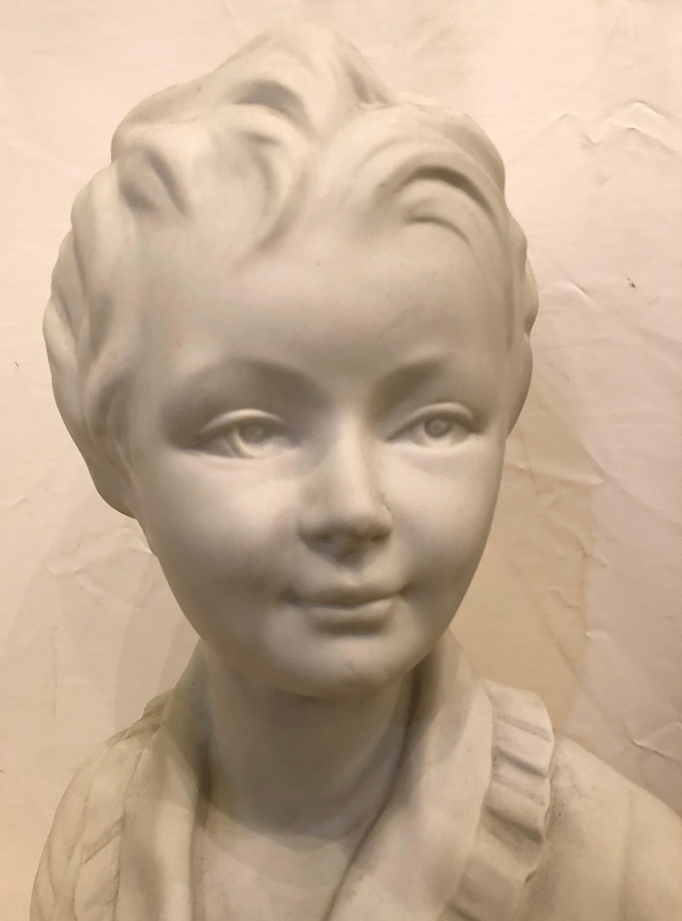 Mid-20th Century Pair of Limoges Parian and Blu Porcelain Busts of Young Children Stamped Fharaud