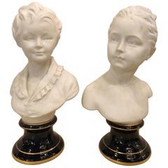Pair of Limoges Parian and Blu Porcelain Busts of Young Children Stamped Fharaud