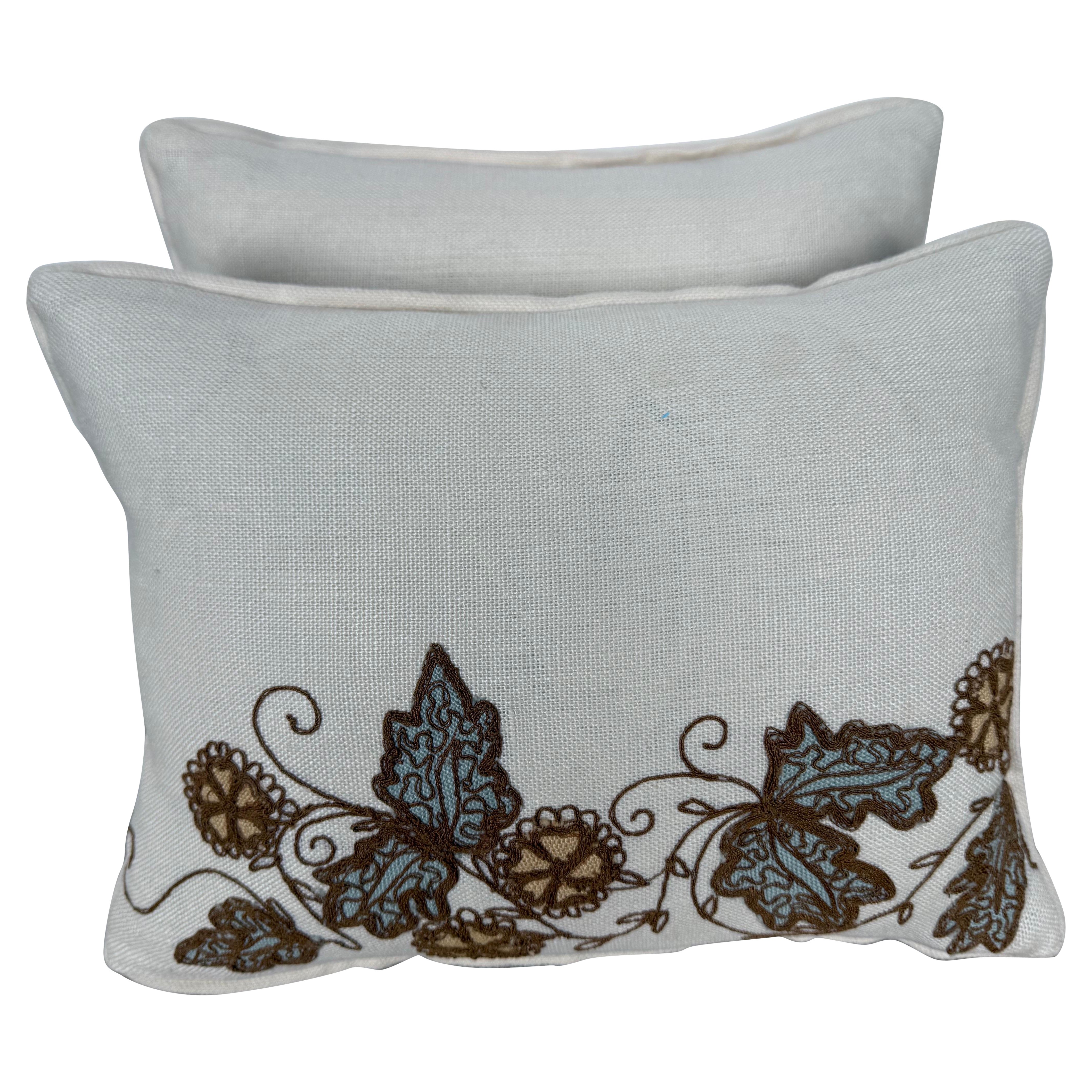 Pareja de almohadas de lino bordado