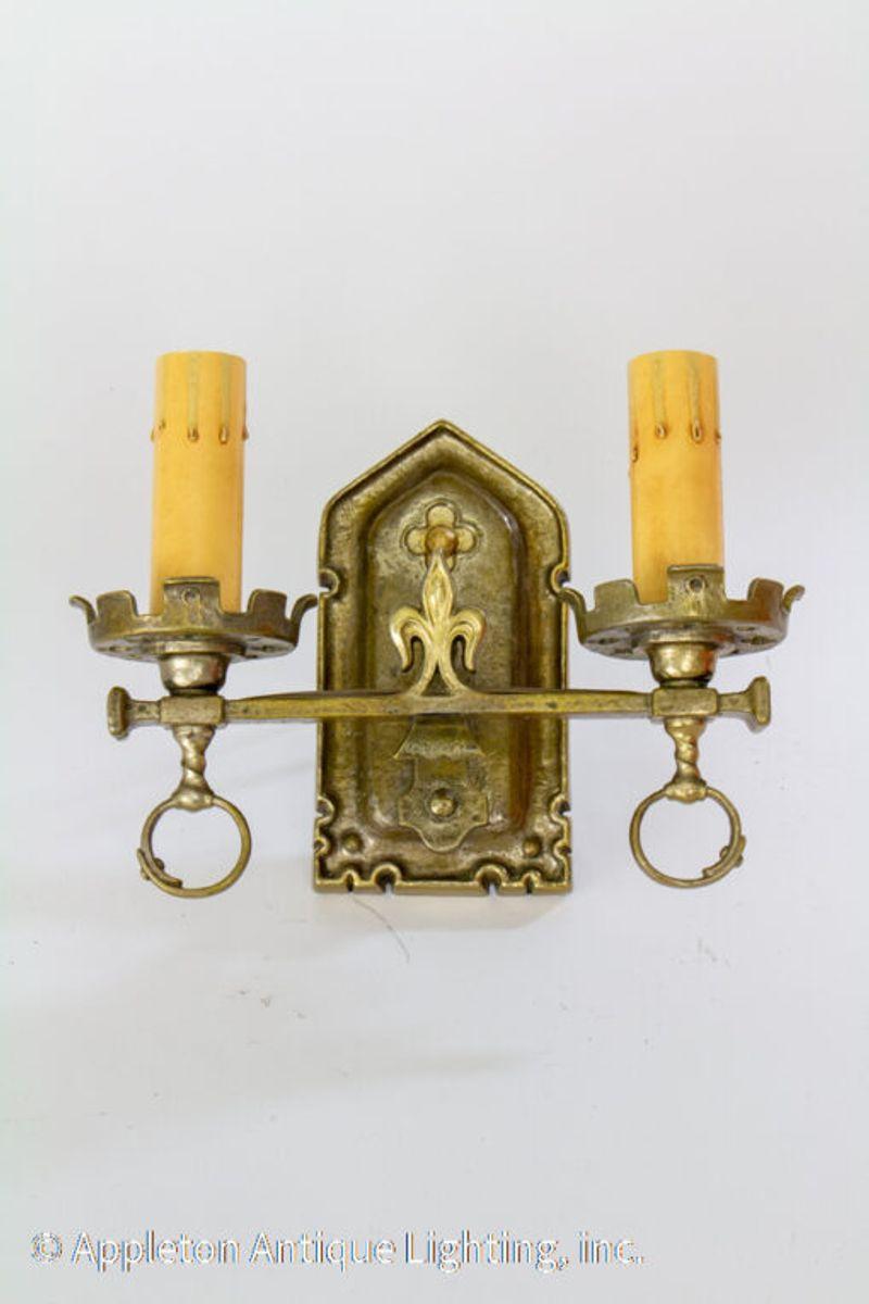 Pair of Lion Electric Double Arm Brass Sconces In Excellent Condition For Sale In Canton, MA