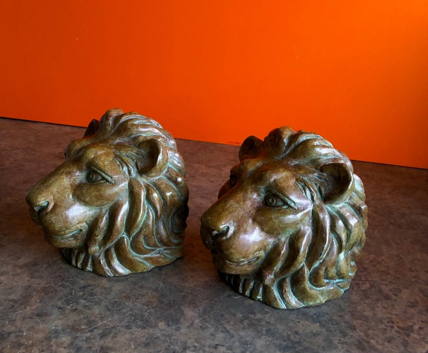 American Pair of Lion Head Bookends in Bronze