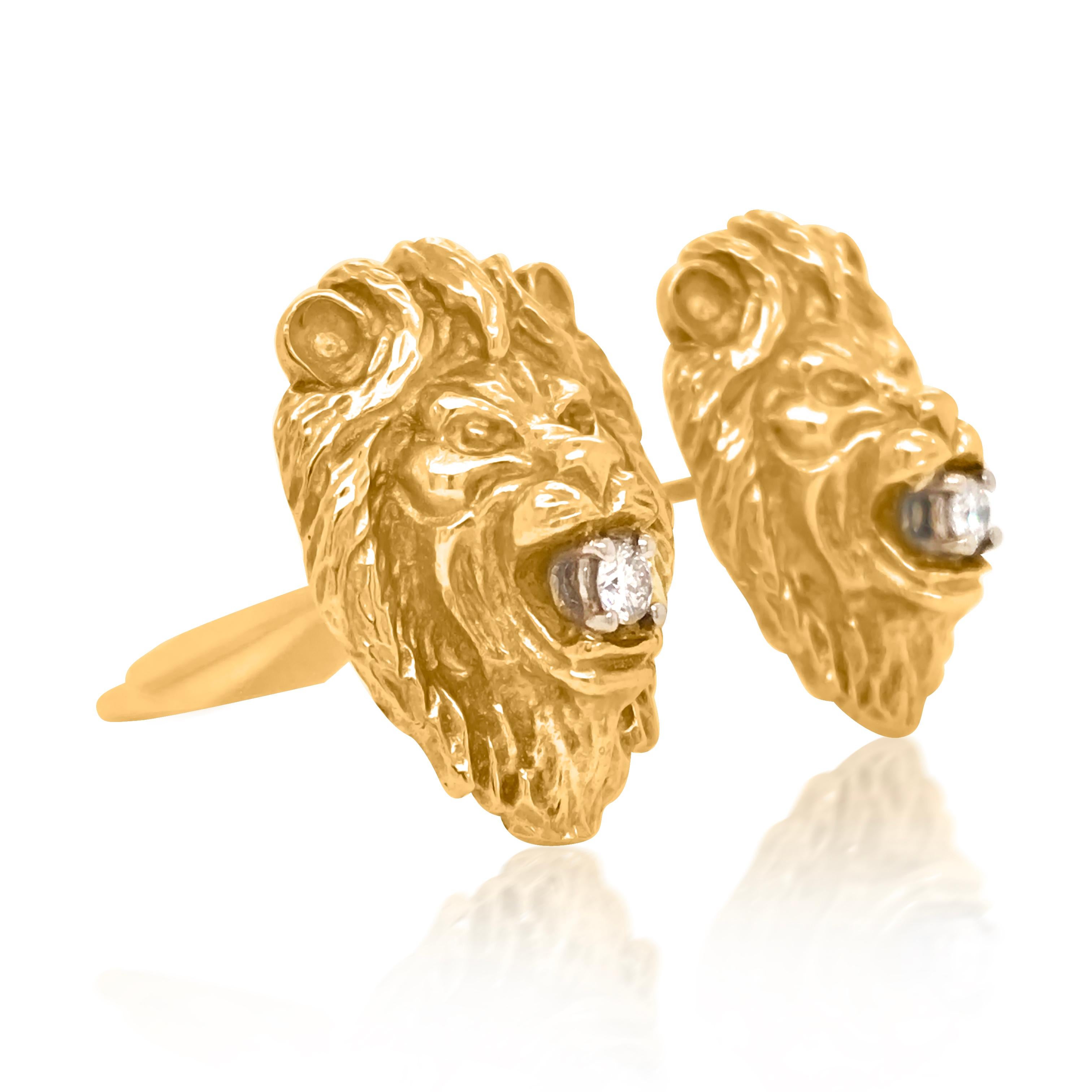 These magnificent lion head cuff-links are crafted in solid 18K yellow gold and with links in 14K yellow gold, weigh 20.54 grams and measure 23x17mm. These distinguished cufflinks are designed as a lion head with the vividly carved pattern as hair