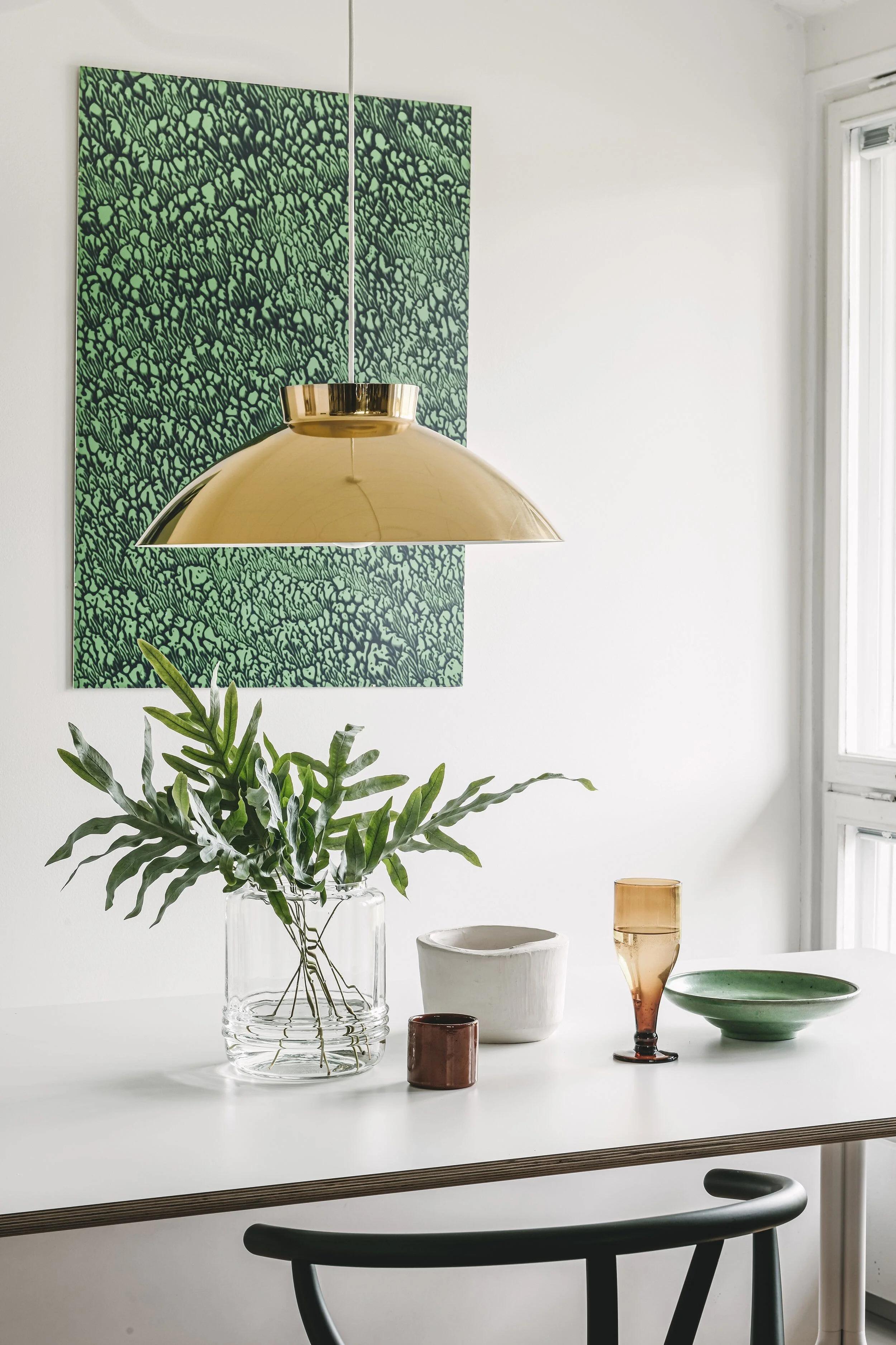 Pair of Lisa Johansson-Pape 'Sirri' Pendants in Brass for Innolux. Originally designed in the 1960s, these authorized re-editions by Innolux Oy of Finland are true to the original charming simplicity of Pape's iconic vision. The high-quality