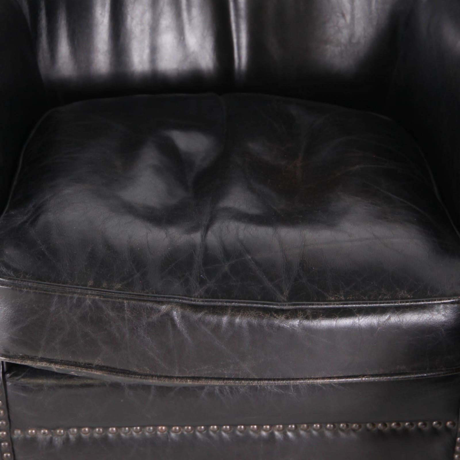 Pareja de sillones club vintage de cuero negro. Poca talla pero muy cómoda. Muy buen estado.