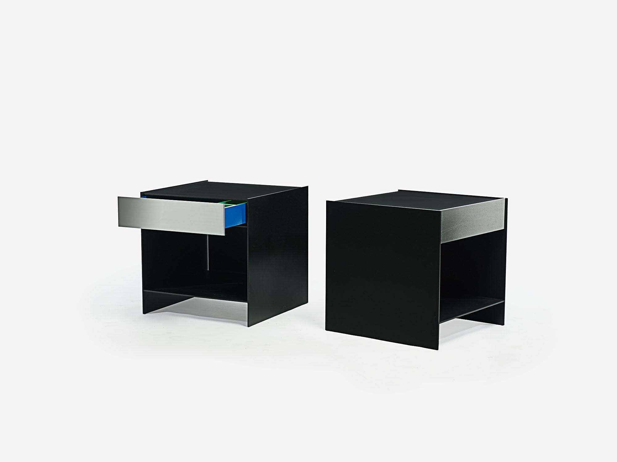 Lividi nightstands (Italian for black and blue Bruises) produced in powder-coated and mirror-polished, quarter-inch thick aluminum plate. Solid aluminum drawer construction with removable neon lime-green acrylic drawer divers and undermount