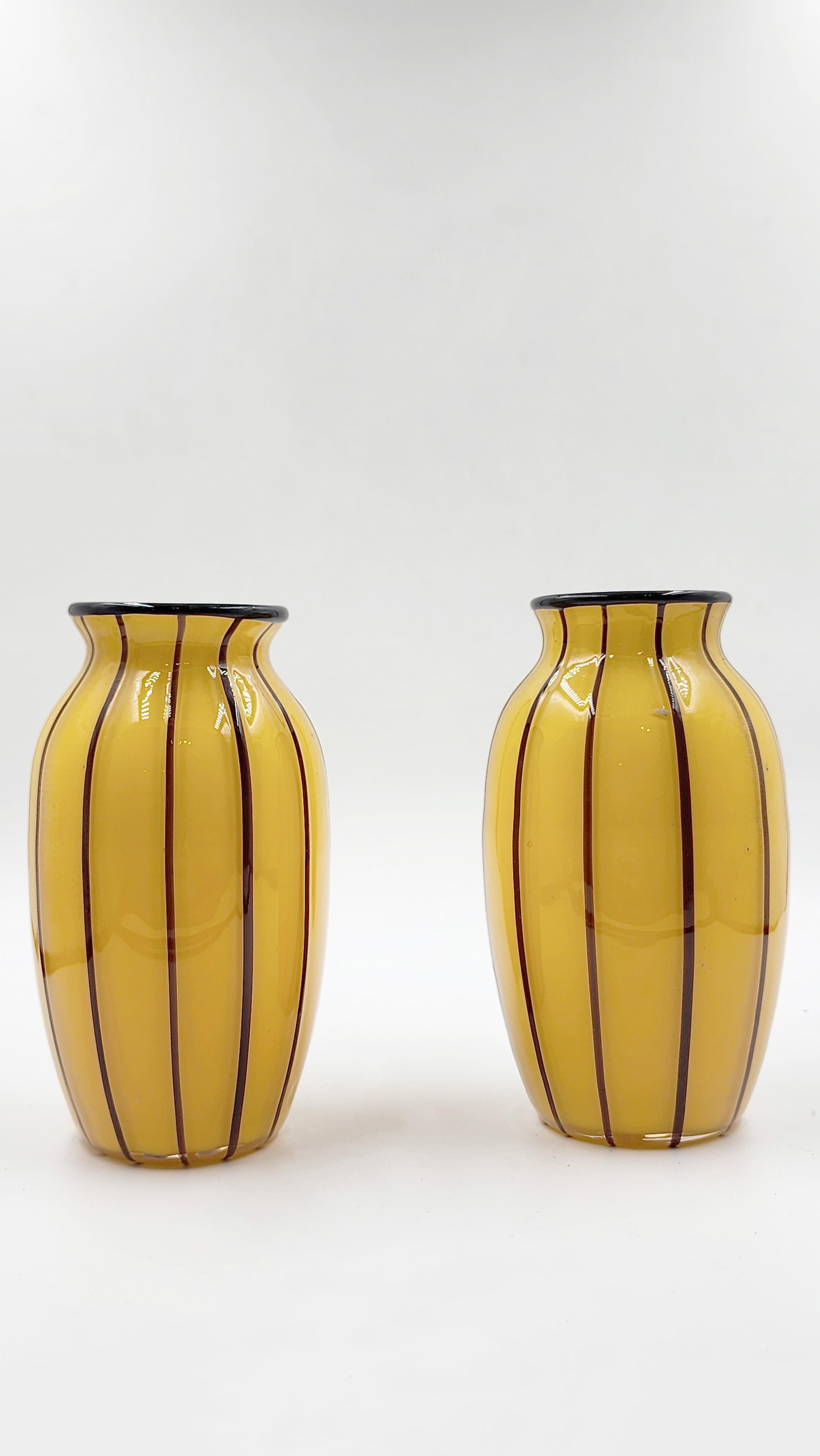Pair of Tango Loetz Glass Vases by Michael Powolny
Elegant pair of Tango glass vases produced by Loetz and attributed to the designs of Michael Powolny, one of the leading figures of the Wiener Werkstätte. These pieces feature the iconic Tango