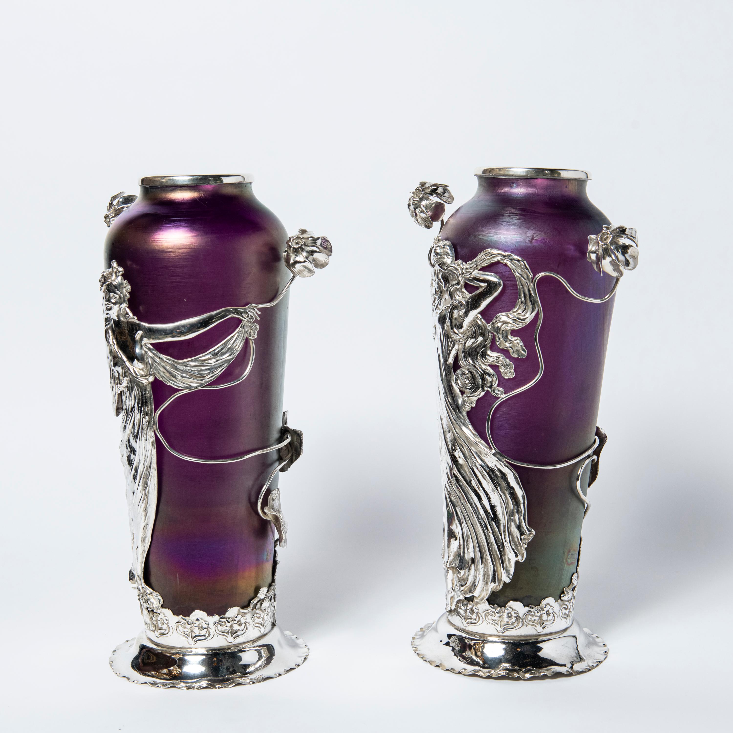 Pair of Loetz glass and silver plate vases. Austria, circa 1900.
Attributed to Loetz.