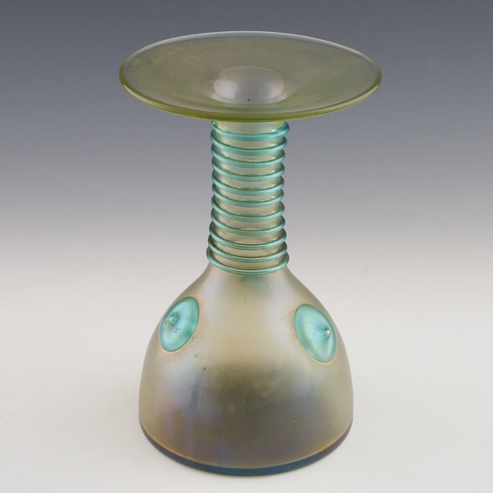 Heading : Pair of Loetz Orpheus vases
Date : c1905 - range introduced 1903
Origin : Loetz, Klostermuhle, Bohemia
Bowl Features : Everted rim, applied turquoise trialing to neck and applied nipple prunts to the body.
Type : Lead
Size : 18.1cm height,