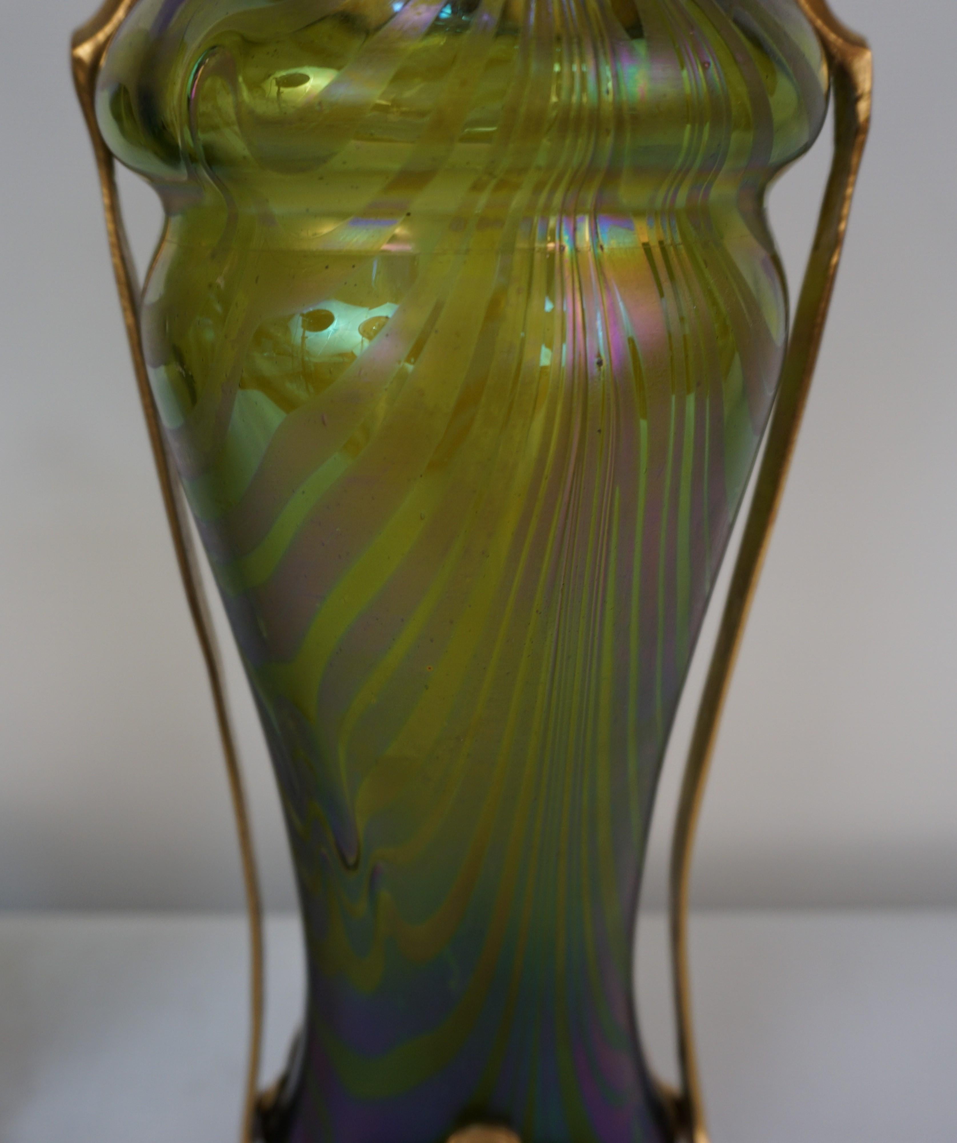 Early 20th Century Pair of Loetz Style Iridescent Art Nouveau Glass and Dore Bronze Vases.