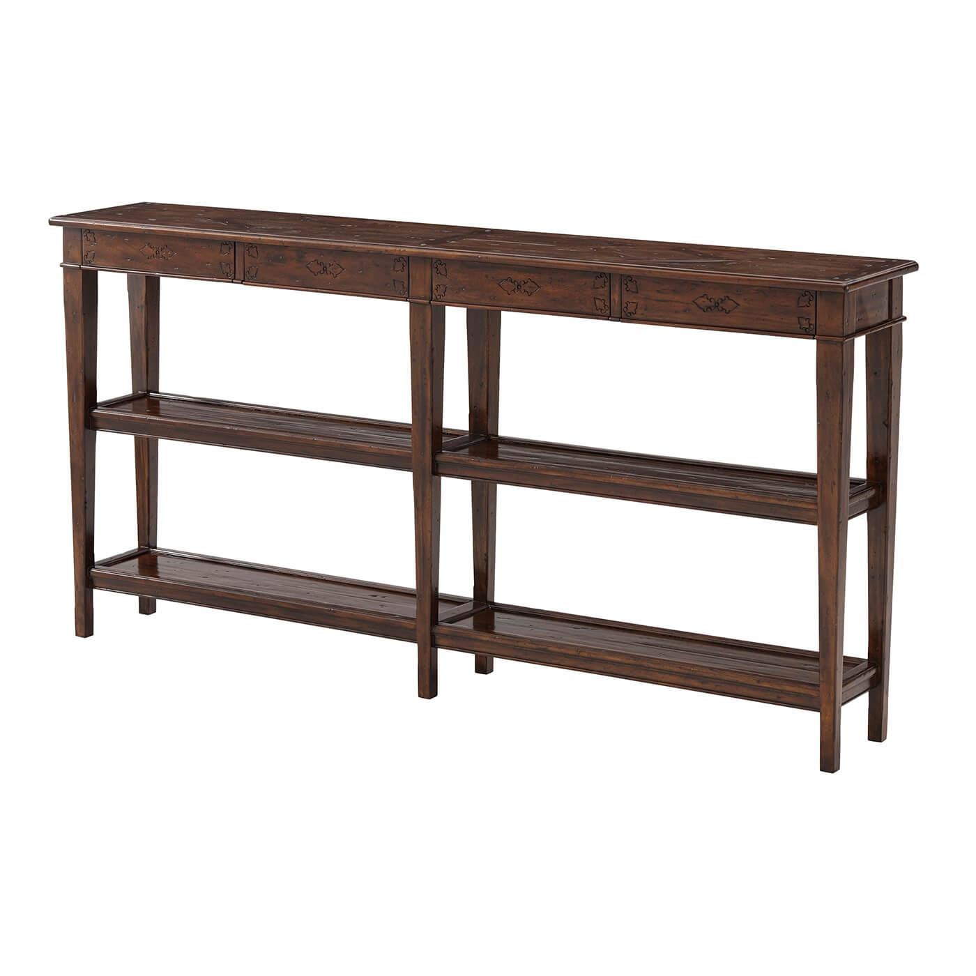 Table console en bois vieilli, avec quatre tiroirs en frise et deux autres niveaux entre des supports carrés effilés. Le provincial français original.

Dimensions : 72