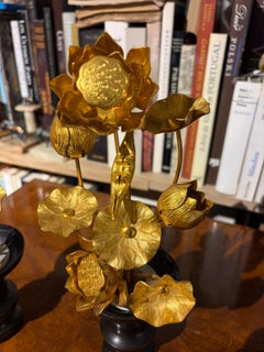 Pair of Lotus Sculptures in Gilded Metal on a Pedestal