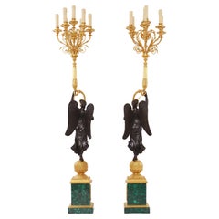 Pair of Louis Philippe style of malachite and ormolu candelabras