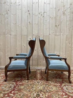 Paire de fauteuils « Voltaire » de style Louis-Philippe en noyer