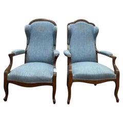 Paire de fauteuils « Voltaire » de style Louis-Philippe en noyer