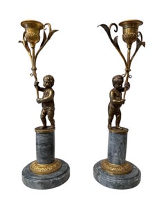 Pair of Louis Seize candle holders