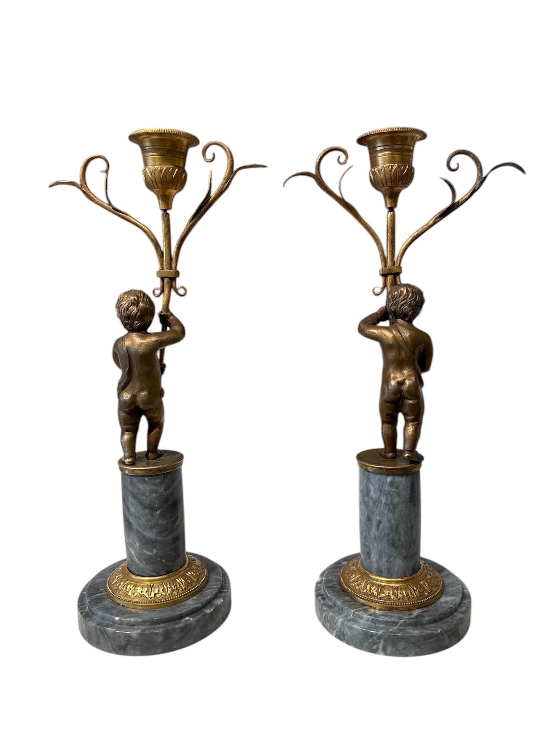 Bronze Pair of Louis Seize candle holders For Sale