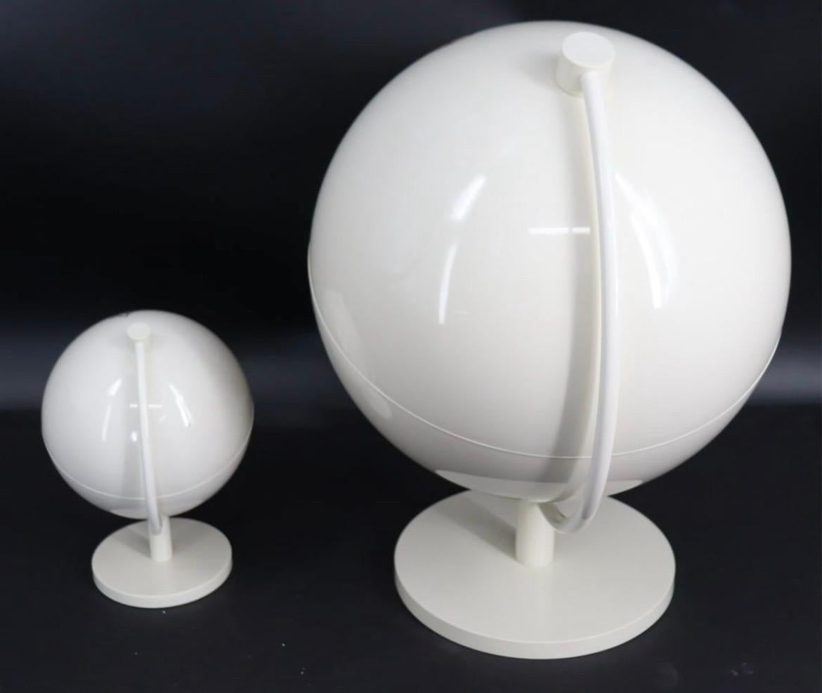 Italian Pair of Louis Vuitton Display White Spinning World Globes Sculpture For Sale